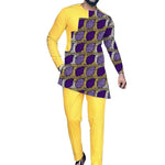 Person wearing a yellow and patterned outfit on a white background